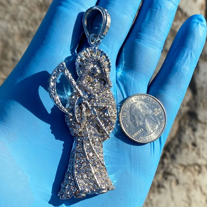 La Santa Muerte Iced Flooded Out Pendant Silver Tone 35 Bling Cartel Admin Necklaces La Santa Muerte Iced Flooded Out Pendant Silver Tone 35 Bling Cartel Admin Necklaces