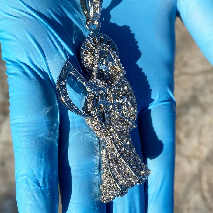 La Santa Muerte Iced Flooded Out Pendant Silver Tone 35 Bling Cartel Admin Necklaces La Santa Muerte Iced Flooded Out Pendant Silver Tone 35 Bling Cartel Admin Necklaces