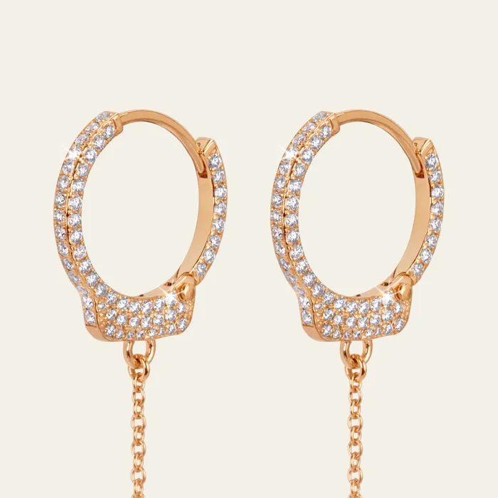 Earrings Hand crafted in 18k rose gold and set with 132 highquality round brilliant cut diamonds Love Lockdown Diamond Earrings