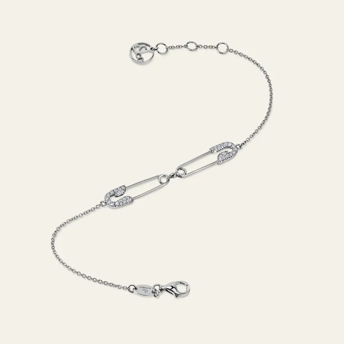 Hand crafted in 18k white gold and set with 36 highquality round brilliant cut diamonds Bracelets Securus Double Pin Bracelet