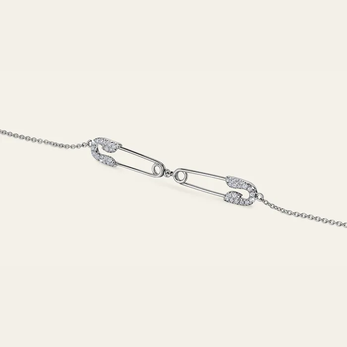 Hand crafted in 18k white gold and set with 36 highquality round brilliant cut diamonds Bracelets Securus Double Pin Bracelet