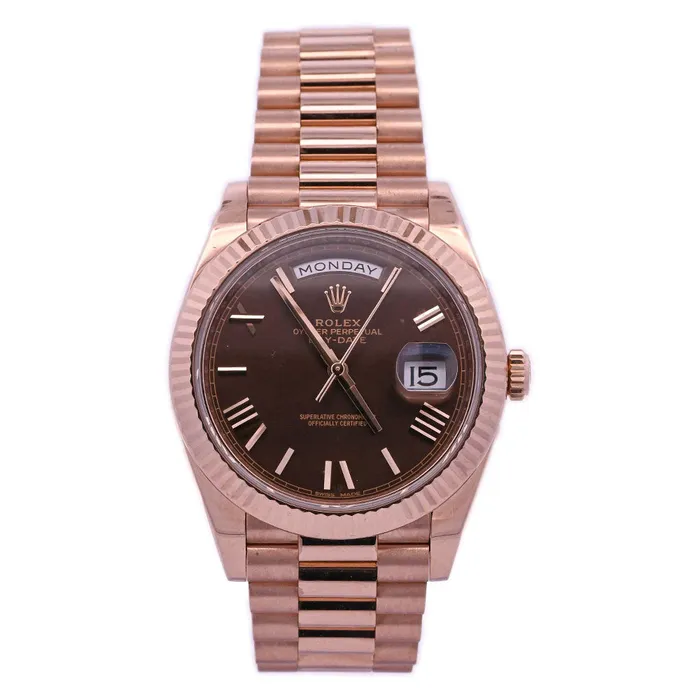 Watches Rolex DayDate Rose Gold 40mm Chocolate Roman Dial Watch Reference 228235 Happy Jewelers Watches Rolex DayDate Rose Gold 40mm Chocolate Roman Dial Watch Reference 228235 Happy Jewelers